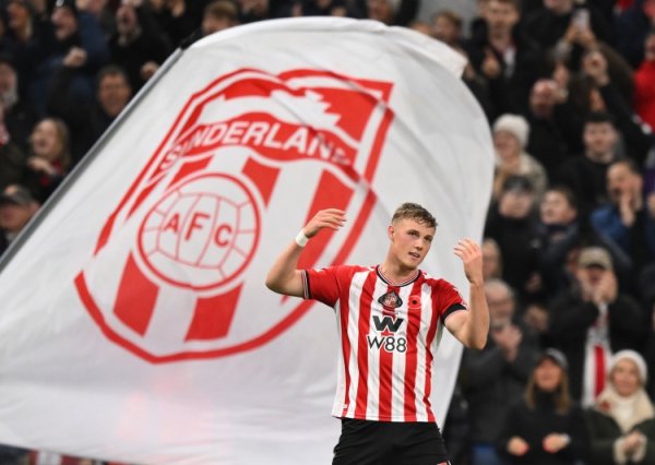 Gunners and team: When Ballard signed his professional contract, some said he could stick his head into a lion s mouth to make a clearance